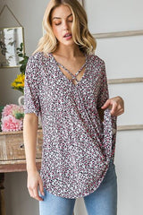 Heimish Full Size Short Sleeve Crisscross Animal Babydoll Top Plus