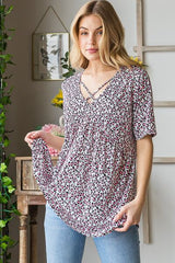 Heimish Full Size Short Sleeve Crisscross Animal Babydoll Top Plus