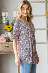 Heimish Full Size Short Sleeve Crisscross Animal Babydoll Top Plus