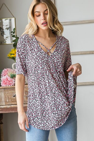 Heimish Full Size Short Sleeve Crisscross Animal Babydoll Top Plus