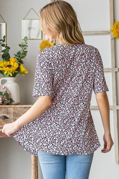 Heimish Full Size Short Sleeve Crisscross Animal Babydoll Top Plus