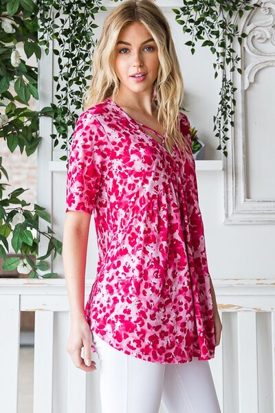 Heimish Full Size Short Sleeve Crisscross Animal Babydoll Top Plus